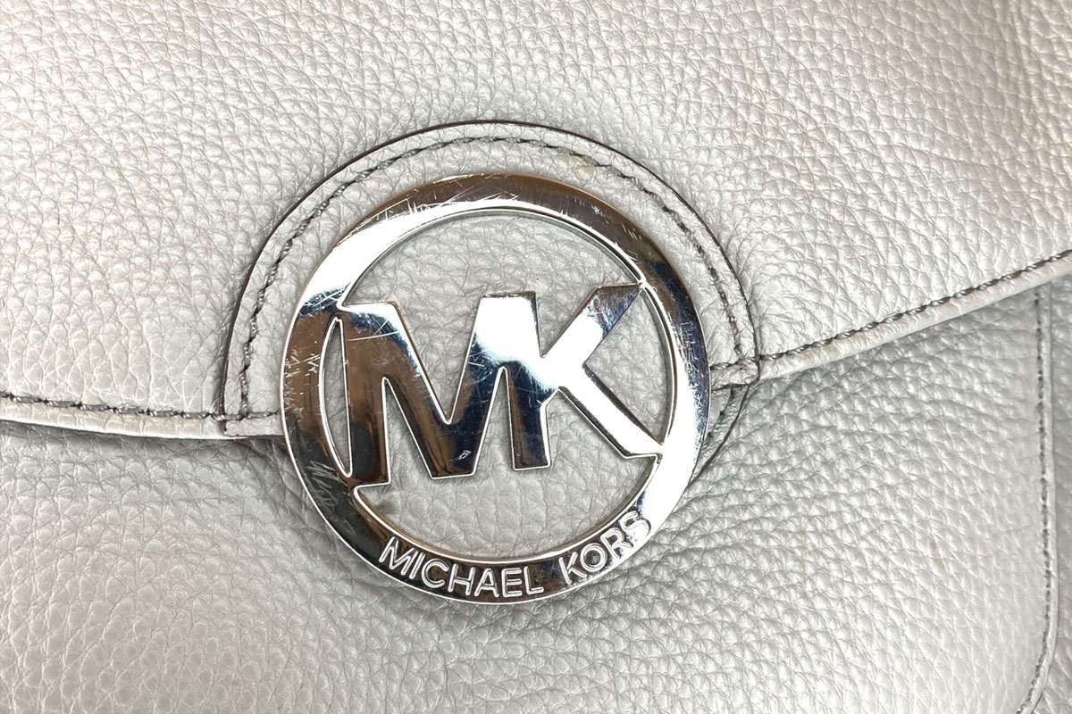 Michael Kors标志设计含义及服装品牌设计理念